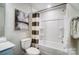 Bathroom featuring a shower-tub combo and neutral color scheme at 2365 Hedgecliff Rd, Kannapolis, NC 28025