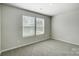 Bedroom with neutral paint, carpet, and natural light at 2365 Hedgecliff Rd, Kannapolis, NC 28025