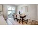 Dining room features table with seating for six and sliding glass doors to outside patio at 2365 Hedgecliff Rd, Kannapolis, NC 28025