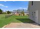 Spacious fenced backyard with a shed and neighboring homes in a serene community at 238 Lippard Springs Cir, Statesville, NC 28677