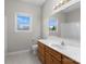 Bathroom with vanity and a sunny window view at 238 Lippard Springs Cir, Statesville, NC 28677