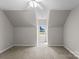 Upstairs bedroom with a large window and carpeted floor at 238 Lippard Springs Cir, Statesville, NC 28677