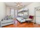 Bedroom features hardwood floors, a ceiling fan, and a bunk bed at 306 Nance Rd, Charlotte, NC 28214