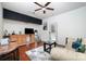 Cozy living area featuring a kitchenette, hardwood floors, and comfortable seating area at 306 Nance Rd, Charlotte, NC 28214