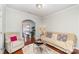 Relaxing living room with hardwood floors and doorway view of adjacent bedroom at 306 Nance Rd, Charlotte, NC 28214
