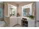 Bathroom showcasing double sinks, wallpaper, tile floors, and a makeup vanity at 310 Berkeley Rd, Rock Hill, SC 29732