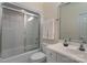 Clean bathroom featuring a shower with glass doors, toilet, and vanity with countertop at 310 Berkeley Rd, Rock Hill, SC 29732