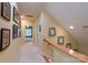 Bright hallway showcasing decorative artwork and providing access to various rooms at 310 Berkeley Rd, Rock Hill, SC 29732