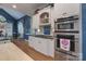 Traditional kitchen features white cabinets, granite countertops, and stainless steel appliances at 310 Berkeley Rd, Rock Hill, SC 29732