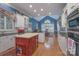 Bright kitchen with an island, modern appliances, and hardwood floors offers a functional space at 310 Berkeley Rd, Rock Hill, SC 29732