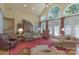 Bright living room with vaulted ceilings, hardwood floors, and large windows offering a bright space at 310 Berkeley Rd, Rock Hill, SC 29732
