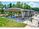 Neighborhood basketball court and park, featuring a covered basketball court and a picnic area at 311 W Center Ave, Mooresville, NC 28115