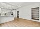 Sun-drenched dining room featuring modern lighting and an open-concept design at 311 W Center Ave, Mooresville, NC 28115