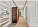 Hallway with luxury vinyl plank floors and access to other rooms at 311 W Center Ave, Mooresville, NC 28115