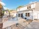 Spacious backyard with an outdoor fireplace, patio, and dining area, perfect for entertaining and relaxing at 3911 Granite St, Terrell, NC 28682