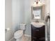 Bathroom features a modern vanity with mirror and new fixtures at 3911 Granite St, Terrell, NC 28682
