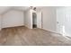Well-lit bedroom offers plush carpeting and ceiling fan; perfect for relaxation and rest at 3911 Granite St, Terrell, NC 28682