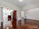 Open dining area with hardwood floors and access to the kitchen, offering an inviting space for meals at 3911 Granite St, Terrell, NC 28682