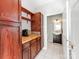 Hallway with wooden shelves and cabinets leading to a bathroom at 3911 Granite St, Terrell, NC 28682