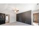 Main bedroom with accent wall plus access to an ensuite bathroom and walk-in closet at 3911 Granite St, Terrell, NC 28682