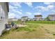 A backyard featuring well-maintained lawn, metal fencing and a swing set at 4630 Bent Green Ln, Monroe, NC 28112