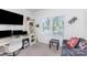 Bedroom with desk, workstation, shelves, and a window. This multipurpose room is perfect as an office at 4630 Bent Green Ln, Monroe, NC 28112