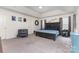 Spacious bedroom features a tray ceiling and decorative wall accents at 4630 Bent Green Ln, Monroe, NC 28112