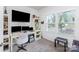 Bedroom featuring a desk, shelves, window, and a comfortable couch. This multipurpose room would make a great office at 4630 Bent Green Ln, Monroe, NC 28112