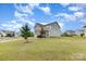 Residential corner lot featuring a well-manicured lawn, two-story home, and sidewalks along the neighborhood street at 4630 Bent Green Ln, Monroe, NC 28112