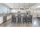 Kitchen island with granite countertop, pendant lighting, and stainless steel appliances at 4630 Bent Green Ln, Monroe, NC 28112