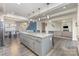 Open kitchen features granite countertops and stainless steel appliances at 4630 Bent Green Ln, Monroe, NC 28112