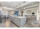 Open kitchen features granite countertops and stainless steel appliances at 4630 Bent Green Ln, Monroe, NC 28112