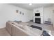Cozy living room with fireplace, TV, and comfortable sectional couch at 4630 Bent Green Ln, Monroe, NC 28112