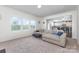 Bright living room featuring large windows and an open floor plan at 4630 Bent Green Ln, Monroe, NC 28112