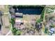 Aerial view of the property showcasing outbuildings and surrounding greenery at 4875 Sulpher Springs Ne Rd, Hickory, NC 28601