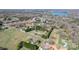 Scenic aerial view showcasing the property's location near a lake and surrounding neighborhood at 4875 Sulpher Springs Ne Rd, Hickory, NC 28601