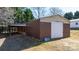 Barn-style outbuilding with a wide sliding door, ideal for equipment storage or hobbies at 4875 Sulpher Springs Ne Rd, Hickory, NC 28601
