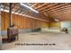 Interior of a large barn/workshop, featuring high ceilings, an open floor plan, and visible wooden beams at 4875 Sulpher Springs Ne Rd, Hickory, NC 28601