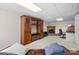 Finished basement area with built-in shelving, a fireplace, and an office space at 4875 Sulpher Springs Ne Rd, Hickory, NC 28601