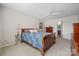 Relaxing bedroom featuring a cozy bed, lamps, and neutral tones for a calming space at 4875 Sulpher Springs Ne Rd, Hickory, NC 28601