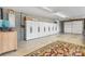 Spacious garage with large cabinet storage and a roll-up door, ideal for a workshop or parking at 4875 Sulpher Springs Ne Rd, Hickory, NC 28601