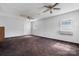 Bright interior with neutral walls, two ceiling fans and natural light from the windows at 4875 Sulpher Springs Ne Rd, Hickory, NC 28601