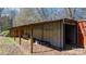 Side view of an exterior outbuilding or shed with metal roof and walls, showing some storage at 4875 Sulpher Springs Ne Rd, Hickory, NC 28601