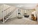 Finished basement with a white-painted fireplace, carpet flooring and neutral decor at 500 Lansdowne Rd, Charlotte, NC 28270