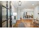 Elegant entryway featuring hardwood floors, stylish decor, and an open view of the dining area at 500 Lansdowne Rd, Charlotte, NC 28270