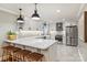 Modern kitchen with sleek countertops, stainless steel appliances, and a breakfast bar at 500 Lansdowne Rd, Charlotte, NC 28270