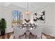 Dining room with a large view window, stylish light fixture, and seating for six at 620 St Lukes Church Rd, Salisbury, NC 28146