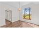 Bright, empty dining room has a view window and access to the entry and other rooms at 620 St Lukes Church Rd, Salisbury, NC 28146