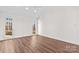Bright and airy room with light wood floors, vaulted ceilings, and natural light at 620 St Lukes Church Rd, Salisbury, NC 28146