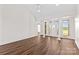 Bright and airy room with light wood floors, vaulted ceilings, and natural light at 620 St Lukes Church Rd, Salisbury, NC 28146